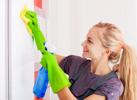 Carpet cleaning staff preparing equipment safely before a cleaning job