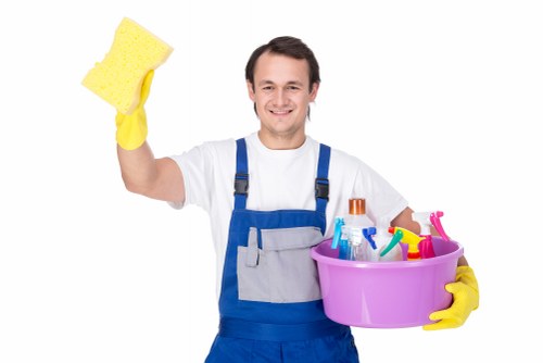 Domestic cleaner preparing a North London property