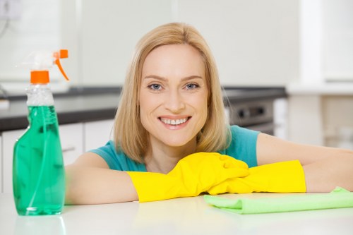 Technician wearing PPE while carrying out carpet cleaning